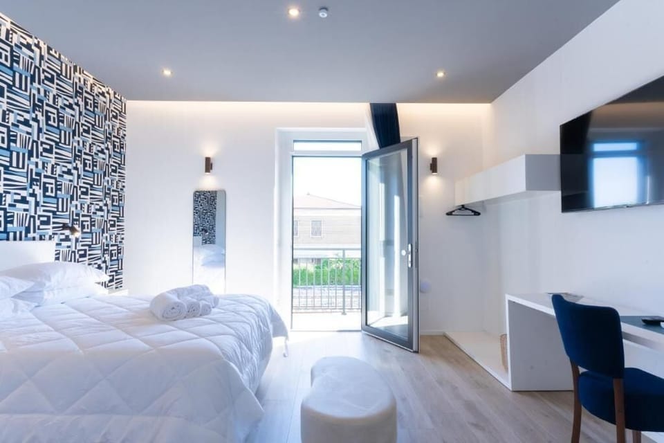 Suite, Balcony, Sea View | Minibar, desk, soundproofing, WiFi (free)