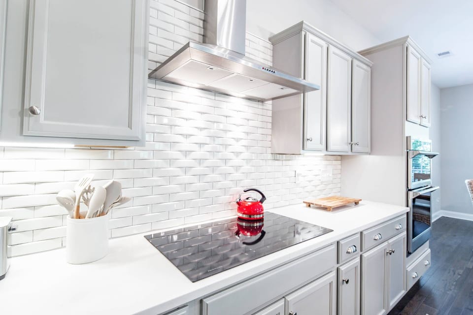 There is a conduction cooktop in the kitchen.  Only certain pots & pans will heat on a conduction cooktop.