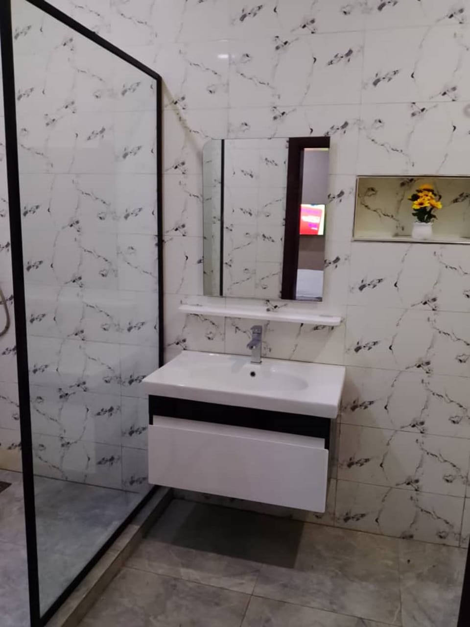 Shower, towels, soap, toilet paper