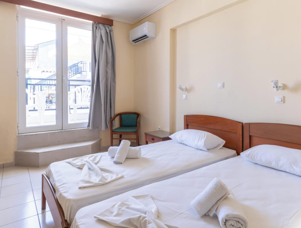 Economy Room, Patio, Pool View | WiFi (free), bed sheets