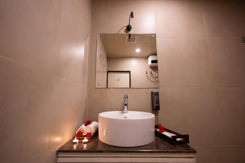 Shower, slippers, towels, soap