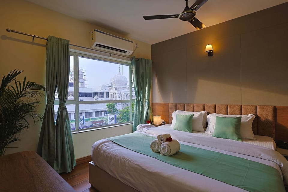 Premium Double Room, City View | In-room safe, desk, blackout drapes, soundproofing