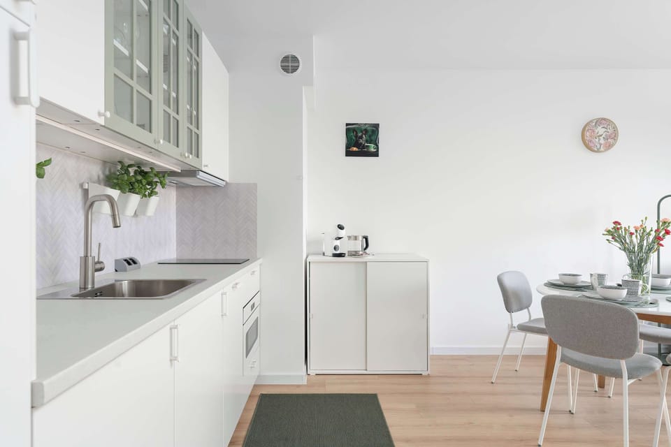 The kitchenette's practical layout maximizes space and functionality.