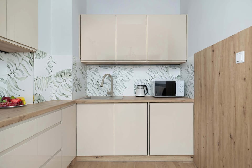 Cook and dine in style with the modern kitchenette and dining area.