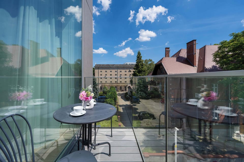 The balcony provides a perfect spot for enjoying the fresh air.