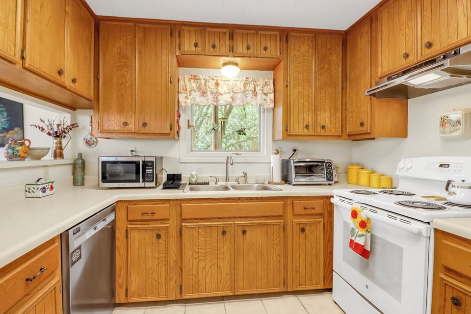 Warm wood cabinetry and ample countertop space
