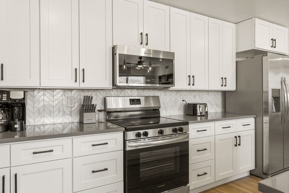 Condo, 2 Bedrooms | Private kitchen | Coffee/tea maker, fridge, oven, toaster