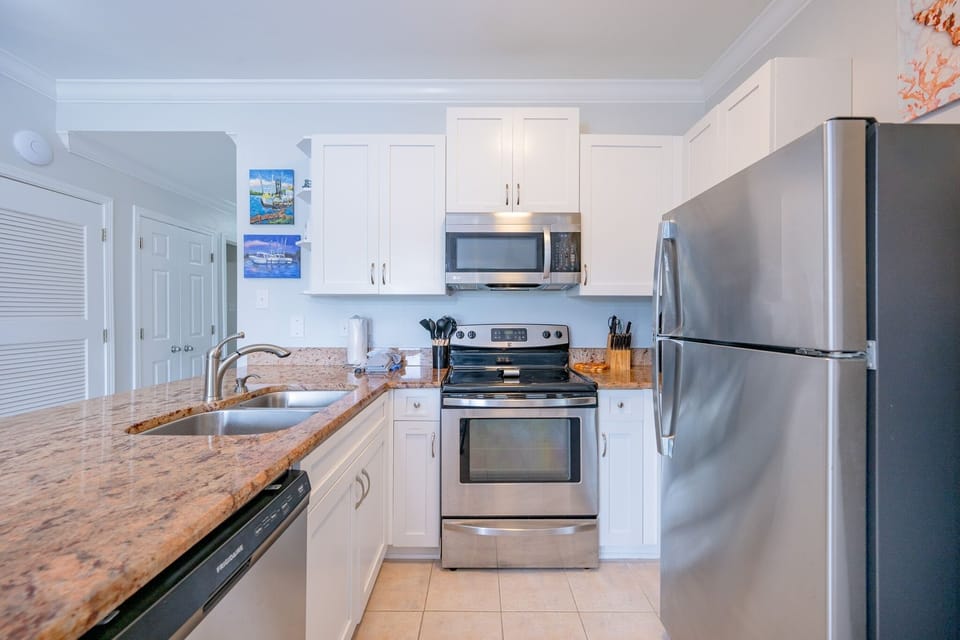 Condo, 2 Bedrooms | Private kitchen | Coffee/tea maker, fridge, oven