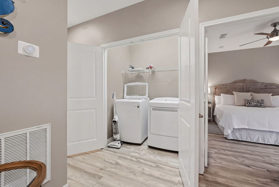 Turtles Nest- Your in-unit laundry closet makes packing light a breeze, with a full-size washer and dryer just steps from your comfortable bedroom.