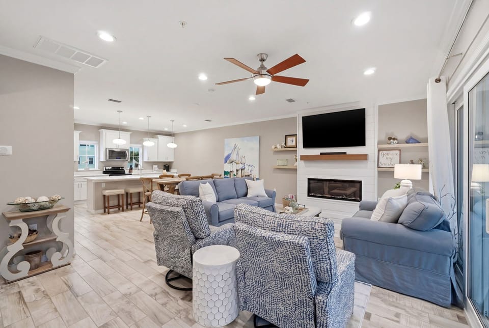 Turtles Nest- Unwind in your beautifully designed open-concept living space, complete with cozy seating, a warm fireplace, and modern entertainment to make every moment memorable.