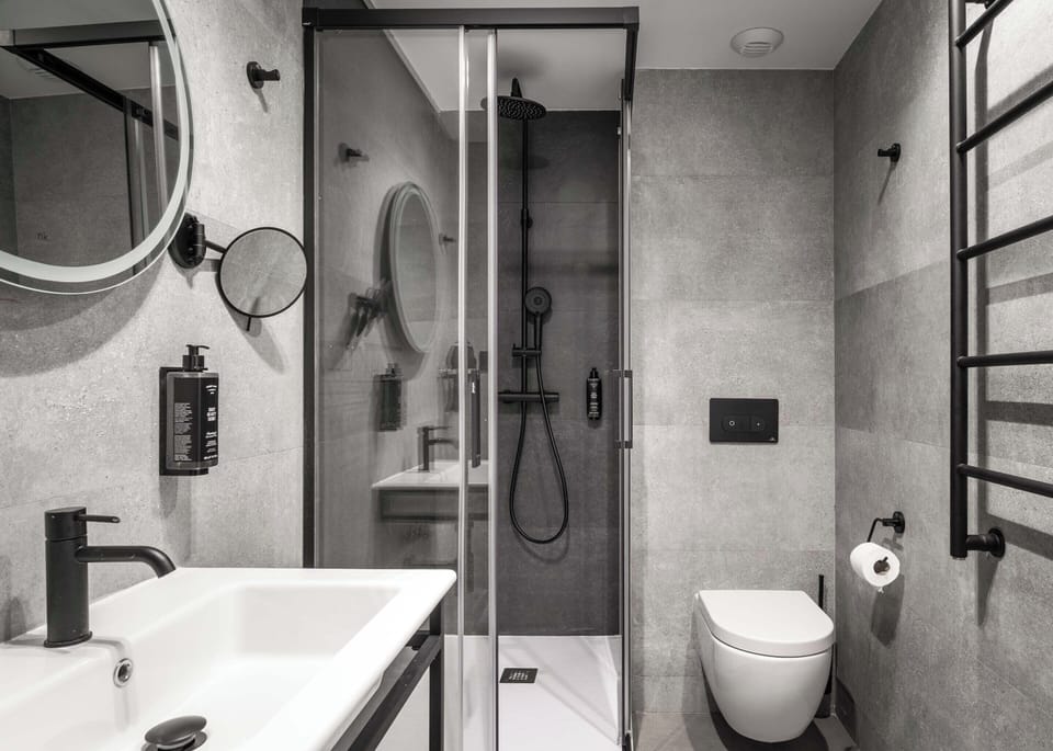 Shower, eco-friendly toiletries, hair dryer, towels