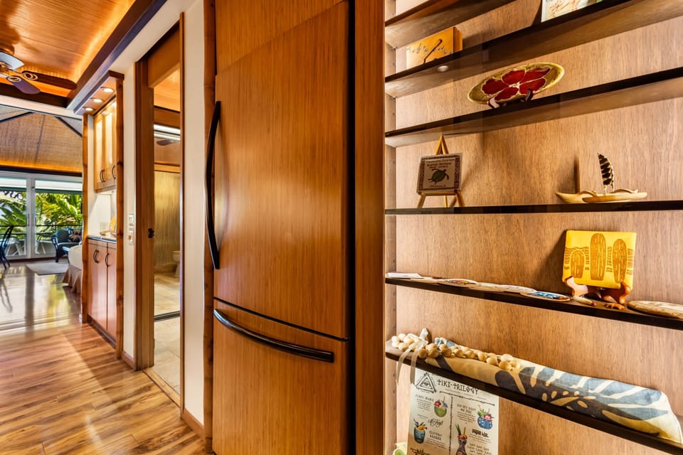 Warm wood finishes and thoughtful island-inspired decor create a welcoming, home-away-from-home feel in your private retreat. Every detail invites relaxation and tropical comfort.