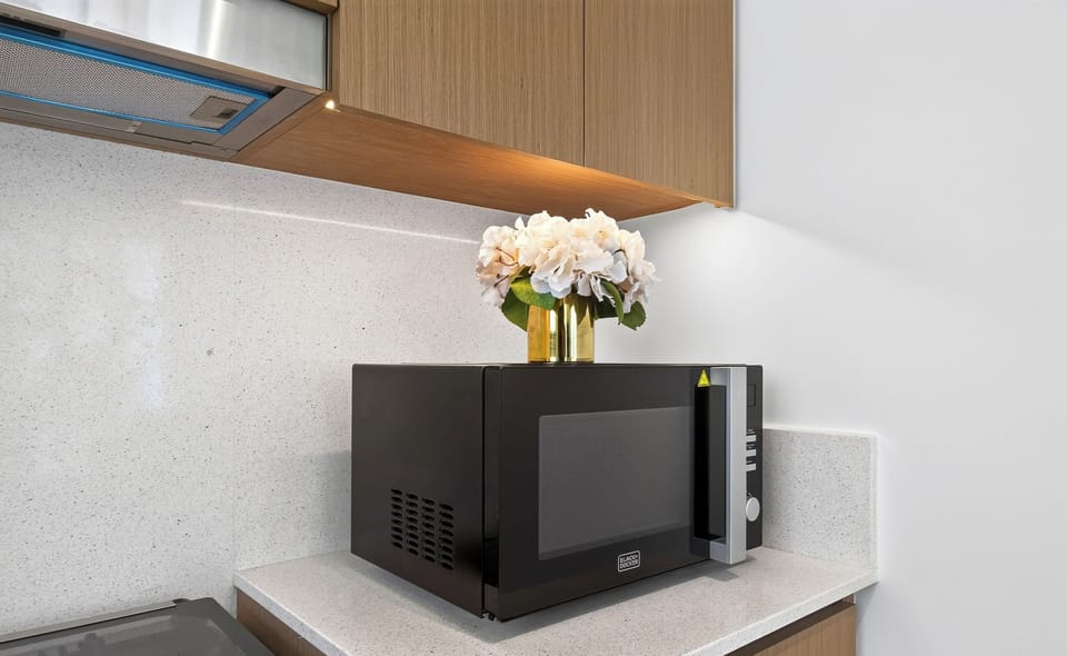 Family Apartment, Pool View | Private kitchen | Full-size fridge, microwave, oven, stovetop