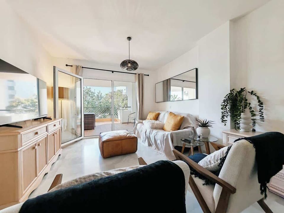 View from the livingroom to patio and garden