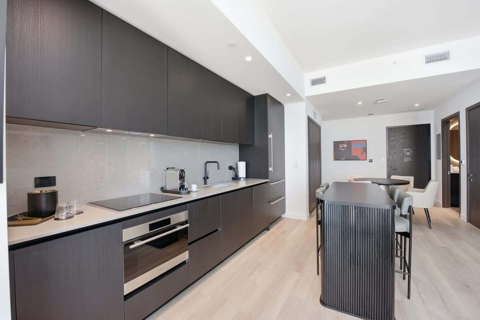 Clean lines and ample storage in the kitchen.