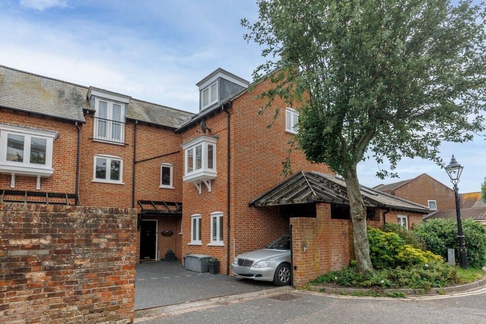 Angel Mews benefits from a private carport within a gated entrance