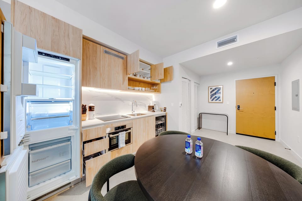 Condo, Balcony, City View | Private kitchen | Espresso maker, fridge, microwave, dishwasher