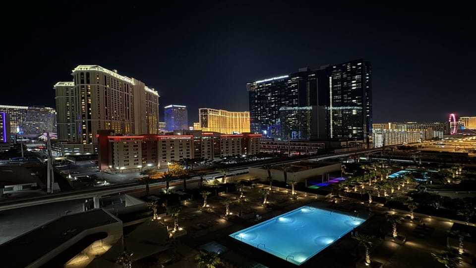 City Skyline View — Las Vegas Strip at Night from 8th Floor, MGM Signature Tower 2, Pool Complex Below