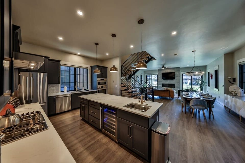 Fully stocked chef`s kitchen with bar seating