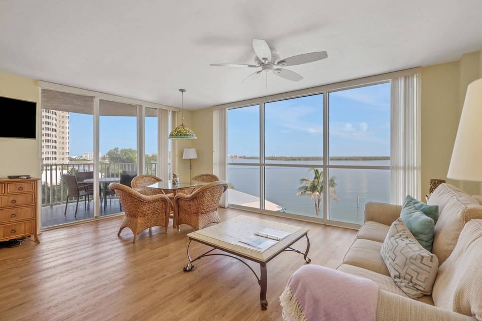With a wall of windows framing the Estero Bay and Big Carlos Pass, the spectacular waterfront becomes part of your everyday living space.