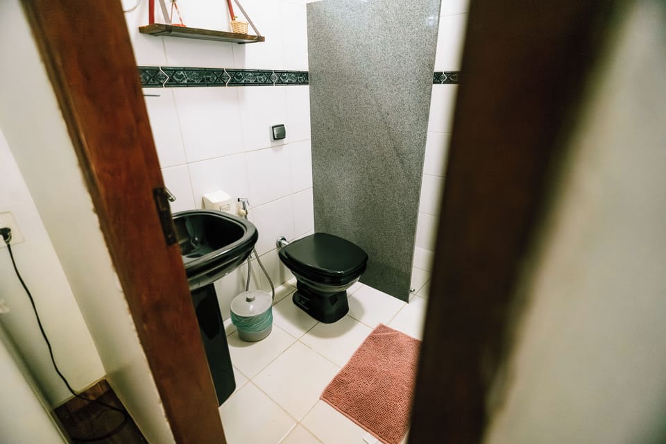 Comfort Double Room, Lanai, Garden View | Bathroom | Shower, towels, soap, toilet paper