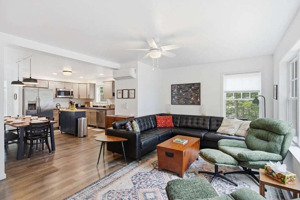 Step inside to a bright, open space where the kitchen flows seamlessly into the cozy living area.