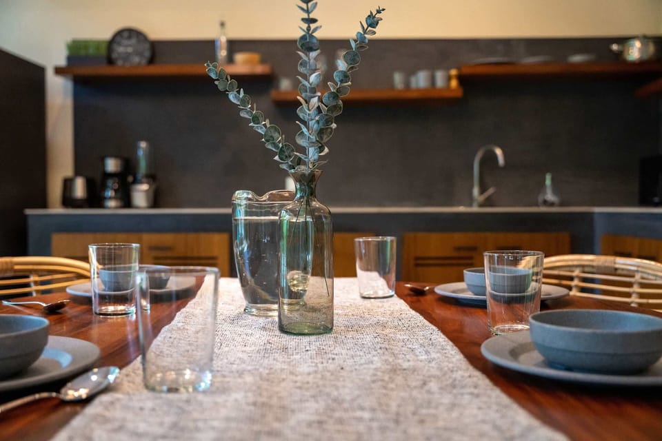 Cook, dine, and relax in an open kitchen and dining space
