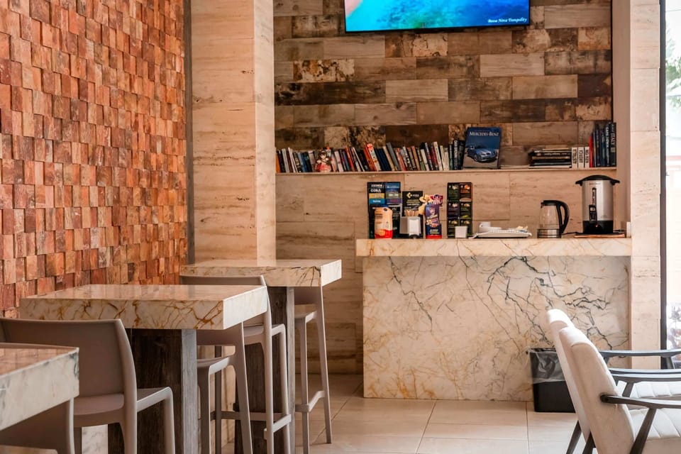 Shared bar-style seating and lounge area, perfect for relaxing outside the apartment.