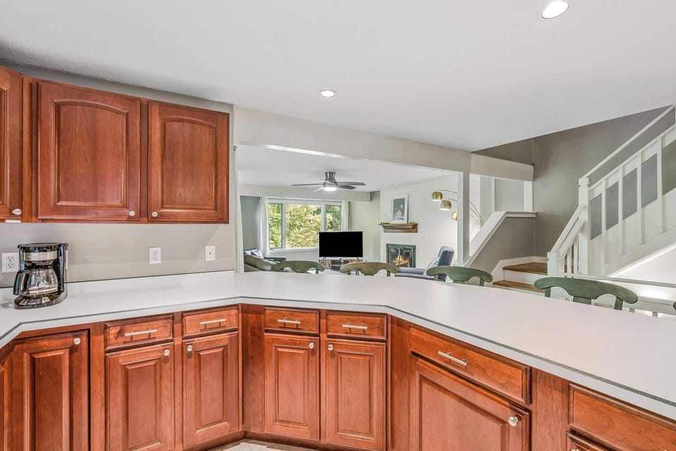 Kitchen open to living and dining areas