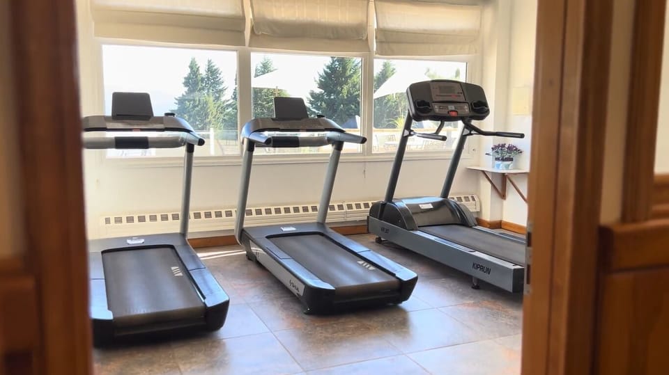 Start the day energized with treadmills and bright garden views.