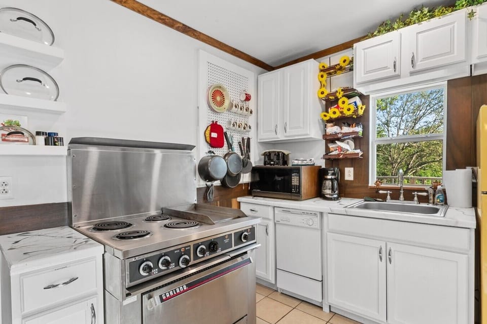 Kitchen | Electric Range & Coffee Station | Dishwasher & Window View