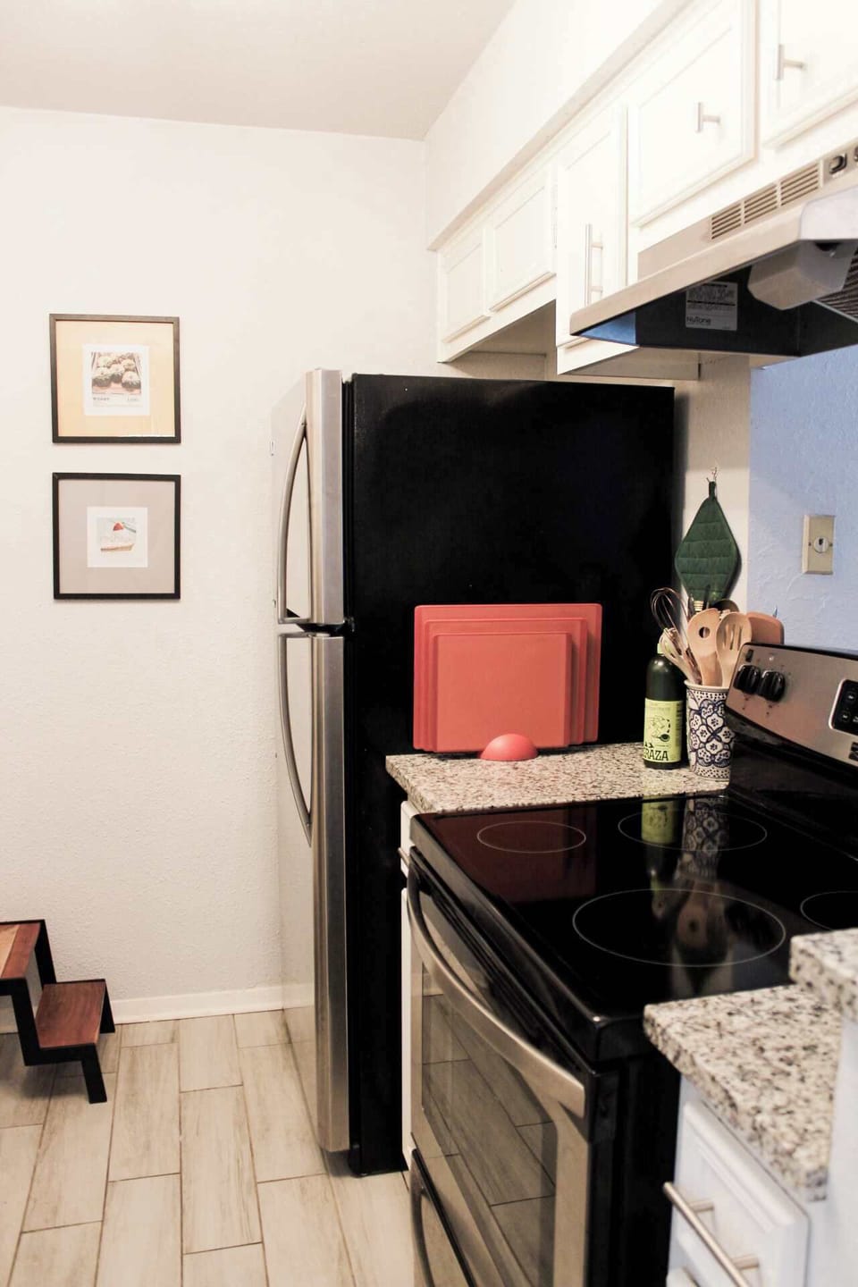 Clean minimalist counters stocked with everything you need to cook a full meal