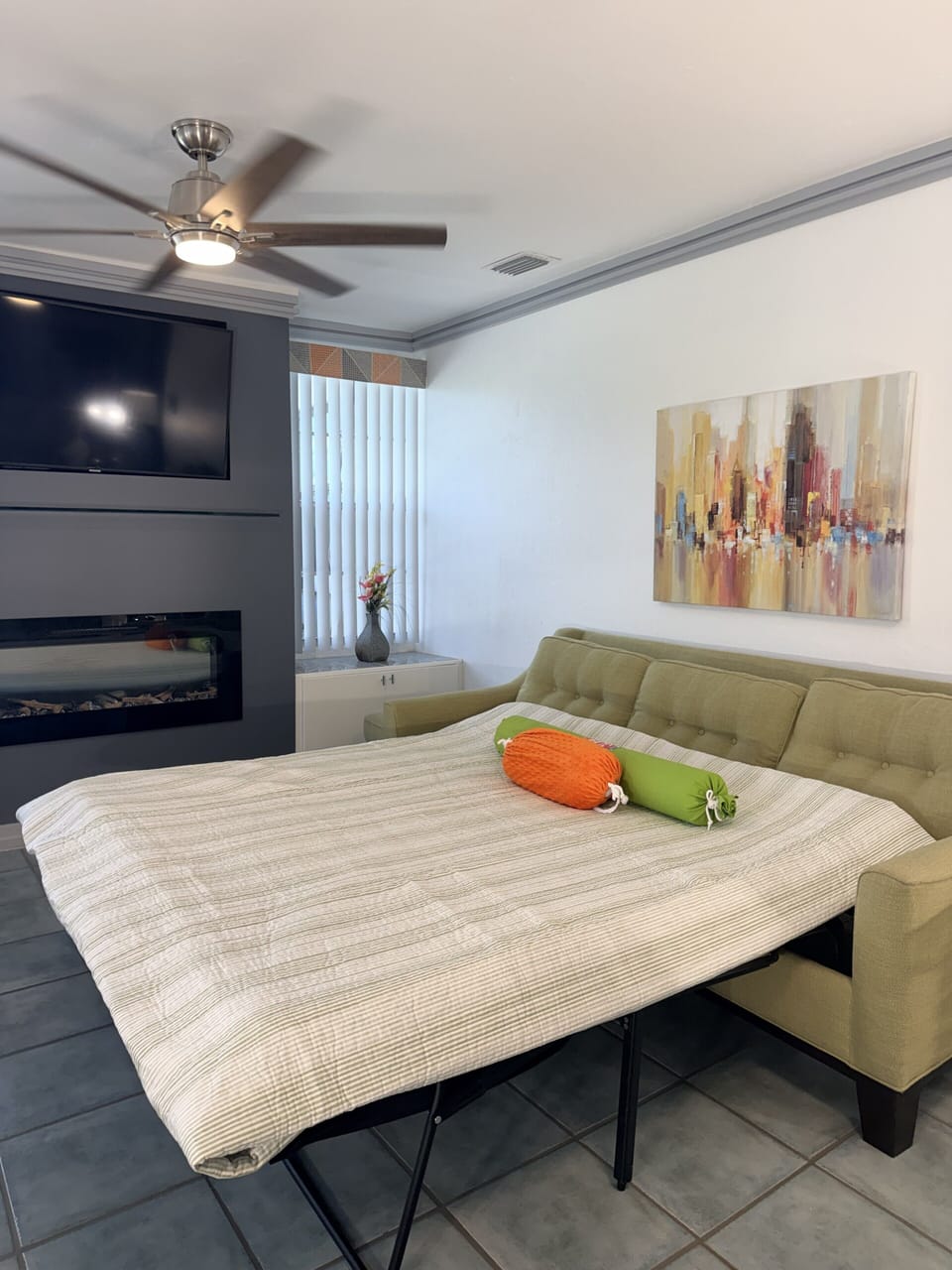 Bright modern dining nook with fireplace and stylish lounge seating