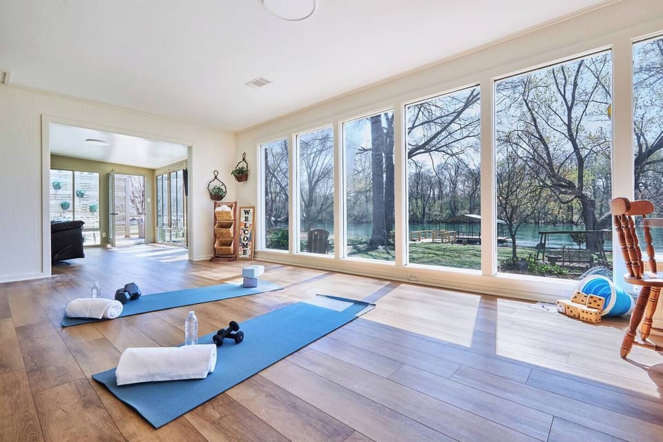 Get some stretching in before you hit the stream (or hit the grill) here in the Sun Room. 