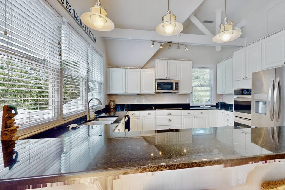 The kitchen has views of the maritime forest to enjoy