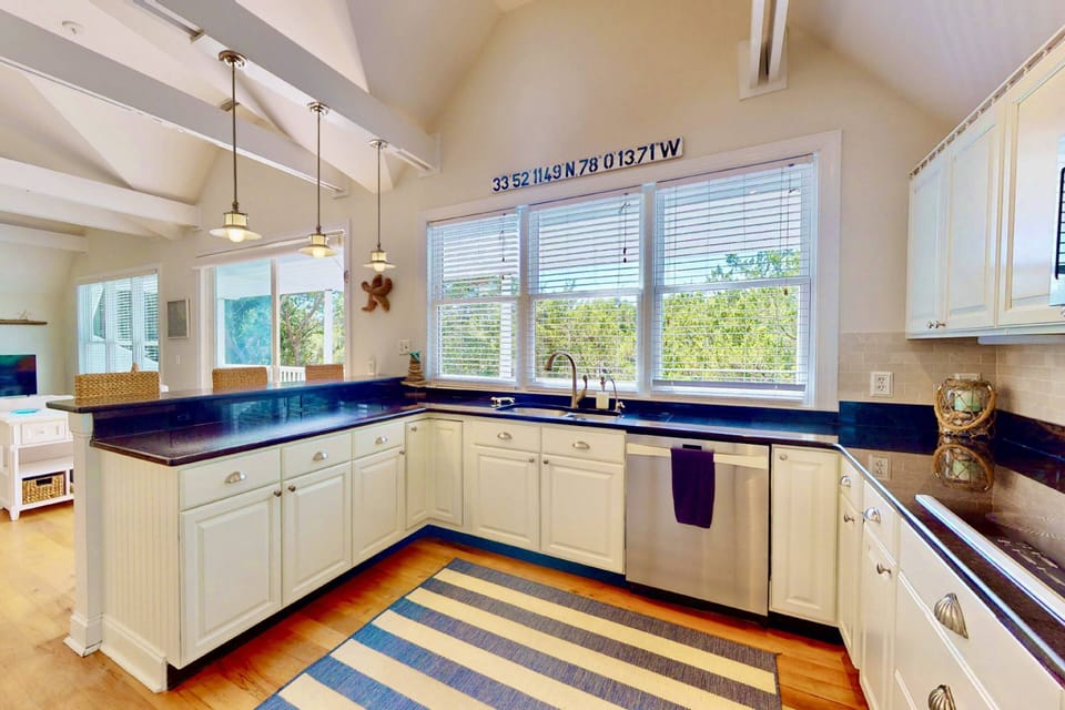 The kitchen offers plenty of counter space to cook up a great meal