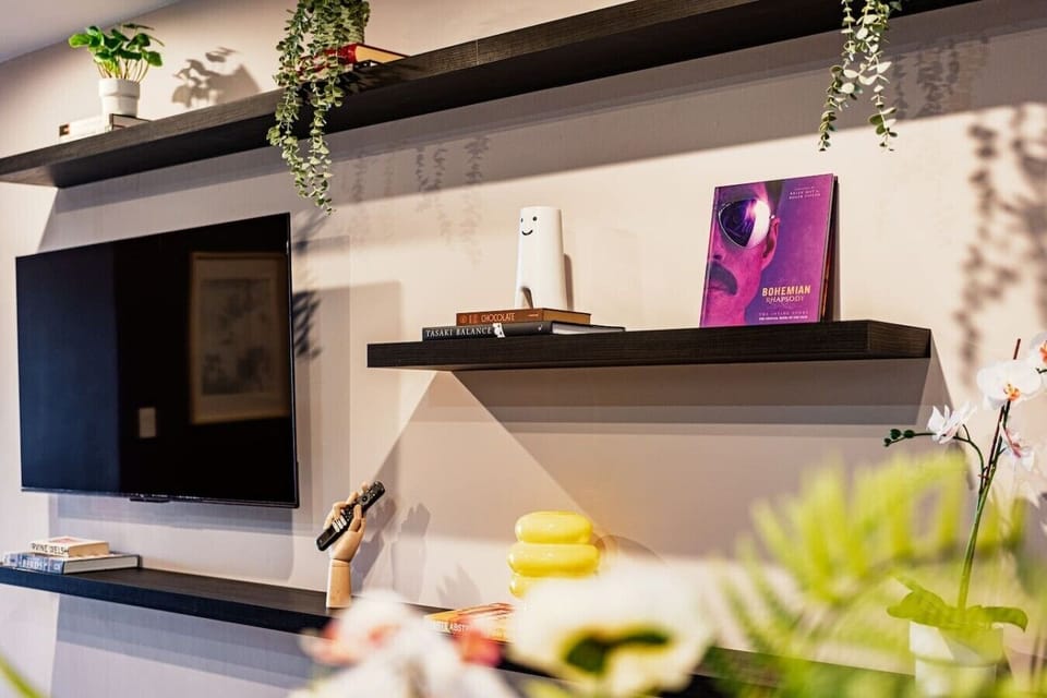 Stylish entertainment nook with little touches that make it feel like home.