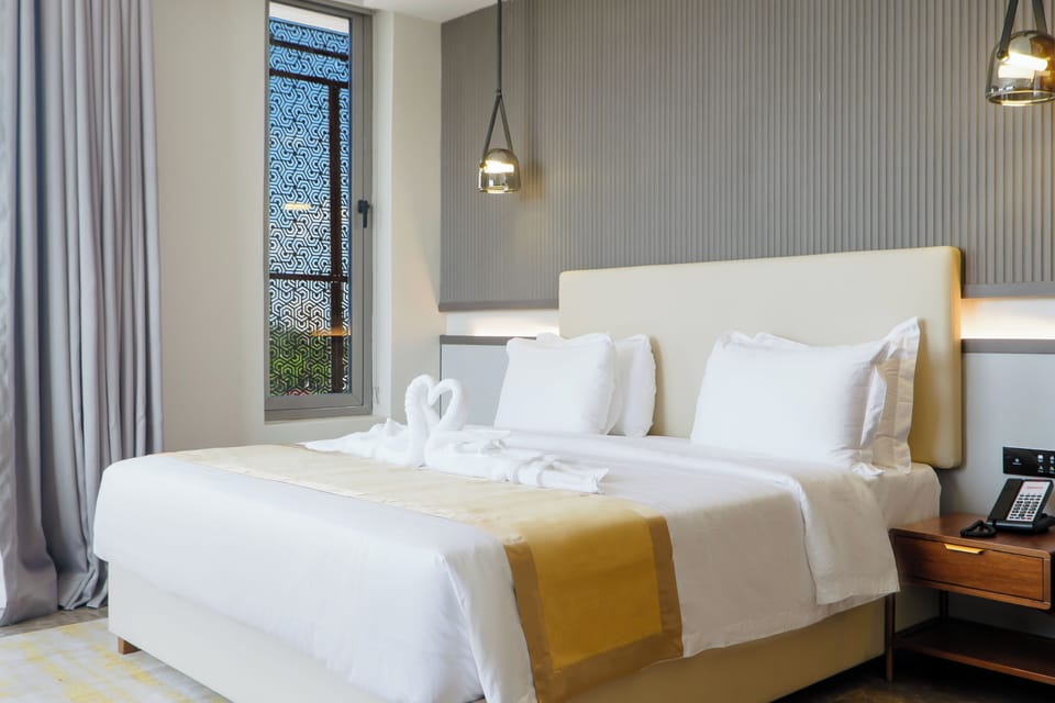 Superior Suite, Balcony, Partial Sea View | In-room safe, blackout drapes, WiFi (free)