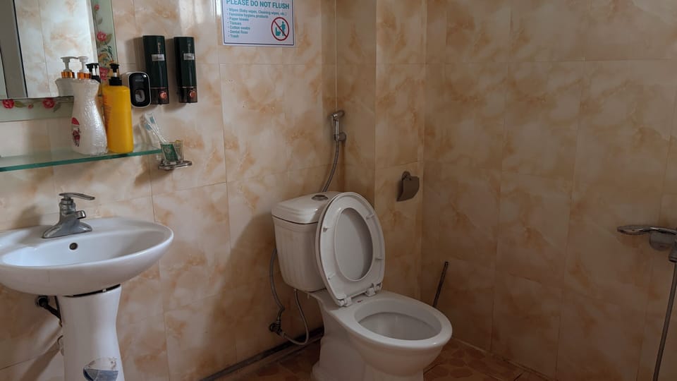 Standard Shared Dormitory | Bathroom | Shower, hair dryer (on request), towels, soap