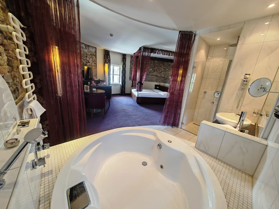 Turm Suite | Bathroom | Hair dryer, towels, soap, shampoo