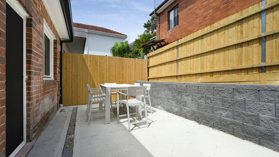 Enjoy your own private outdoor courtyard for dining or unwinding.