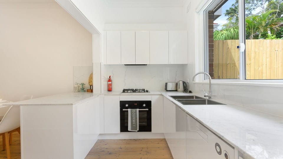 Fully equipped kitchen with quality appliances and plenty of bench space.