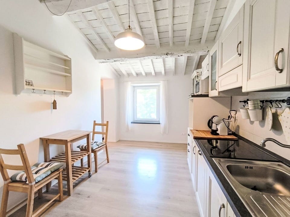 Furniture, Flooring, Wall, Floor, Wood, Interior Design, Ceiling, Room, Door, Home