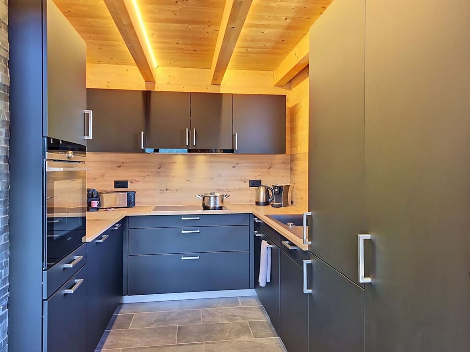 Kitchen, Countertop, Furniture, Wood, Flooring, Cabinetry, Kitchen Appliance, Interior Design, Floor, Major Appliance