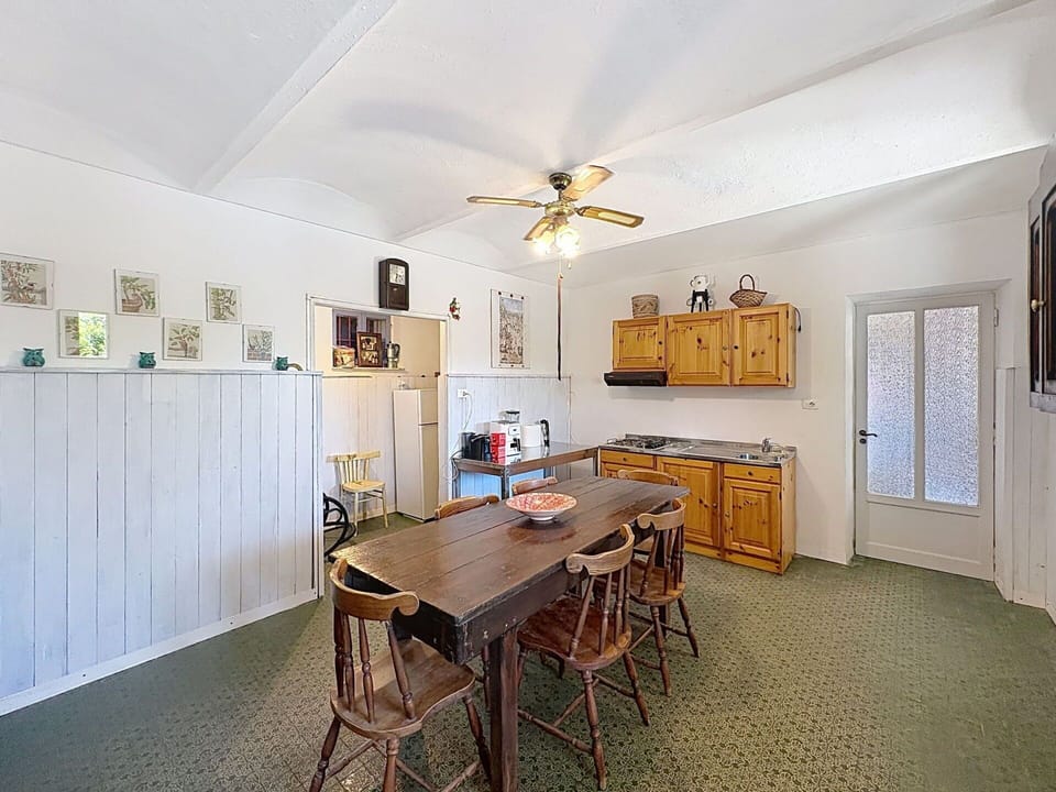 Flooring, Furniture, Interior Design, Ceiling, Wood, Floor, Cabinetry, Room, Lighting, Ceiling Fan