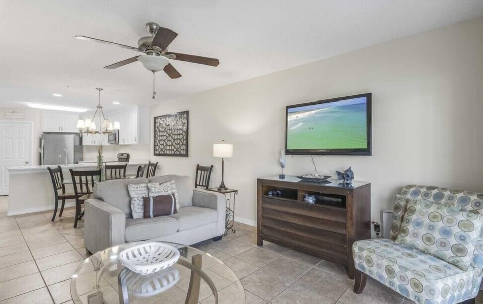 Open floor plan makes it easy for everyone to gather while enjoying the beach-inspired décor.