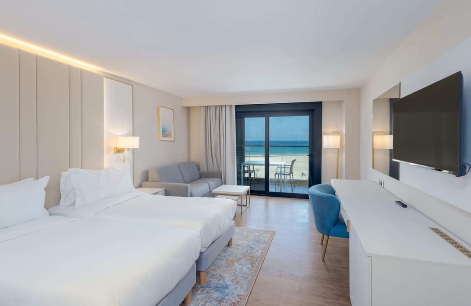 Hypo-allergenic bedding available, minibar (free items), in-room safe