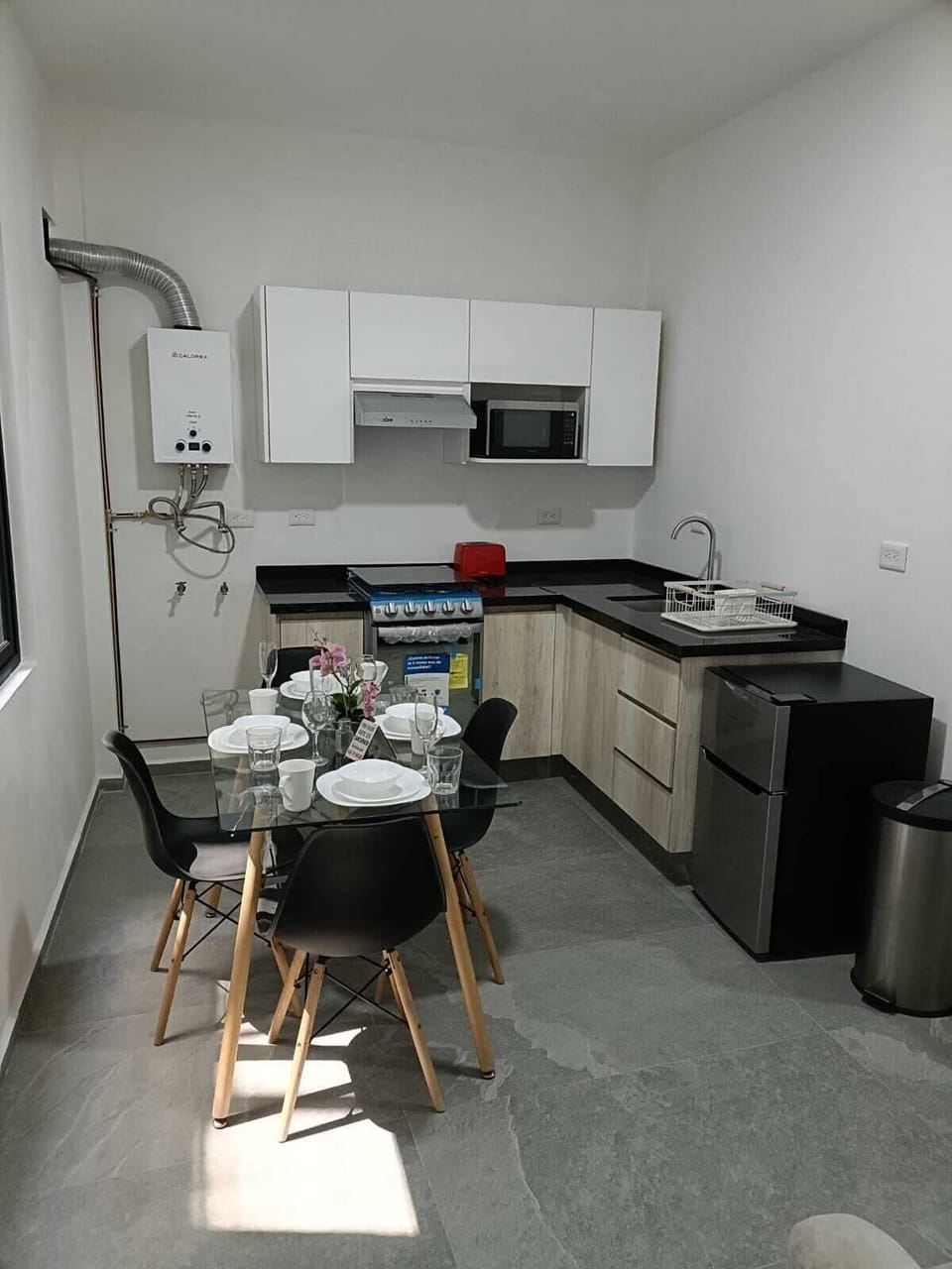 Mini-fridge, microwave, oven, stovetop