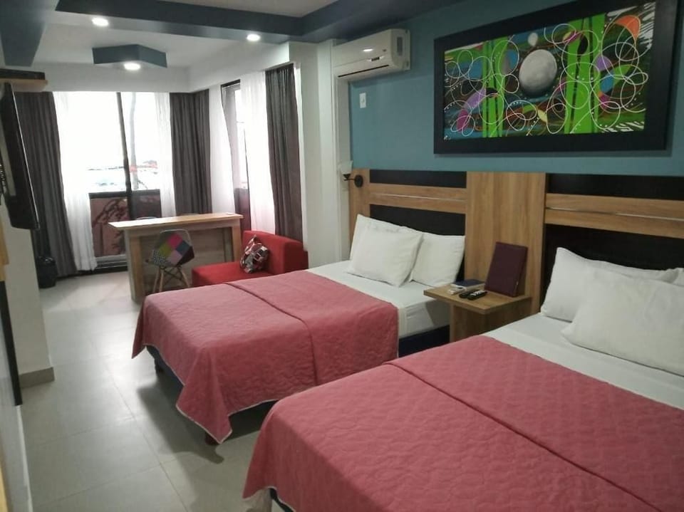 Deluxe Quadruple Room, Ocean View | Desk, laptop workspace, iron/ironing board (on request), WiFi (free)