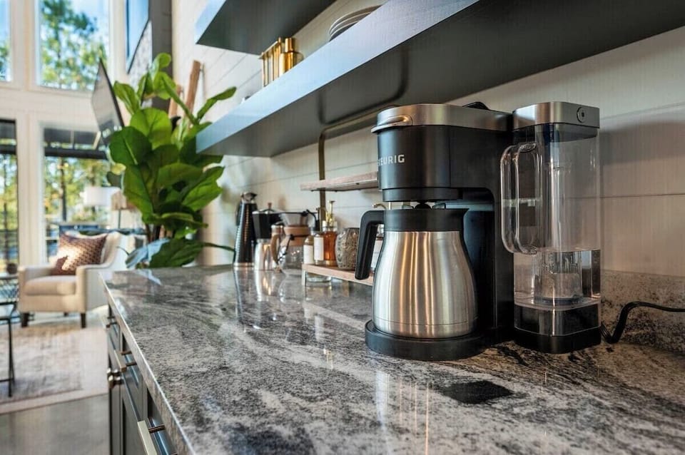 Coffee bar has a Keurig coffee pot and French press
